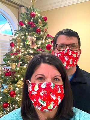DeAnna and Dr. Benjamin Dillard display holiday-themed masks.